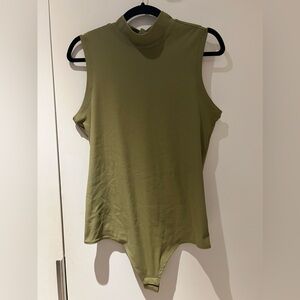 Spanx bodysuit. Size XL. Fits small.